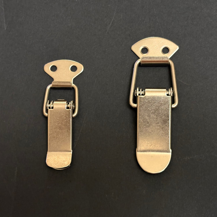 گیره یا چفت کلمپ فنری فلزی نقره ای خارجی بسته 100 عددی